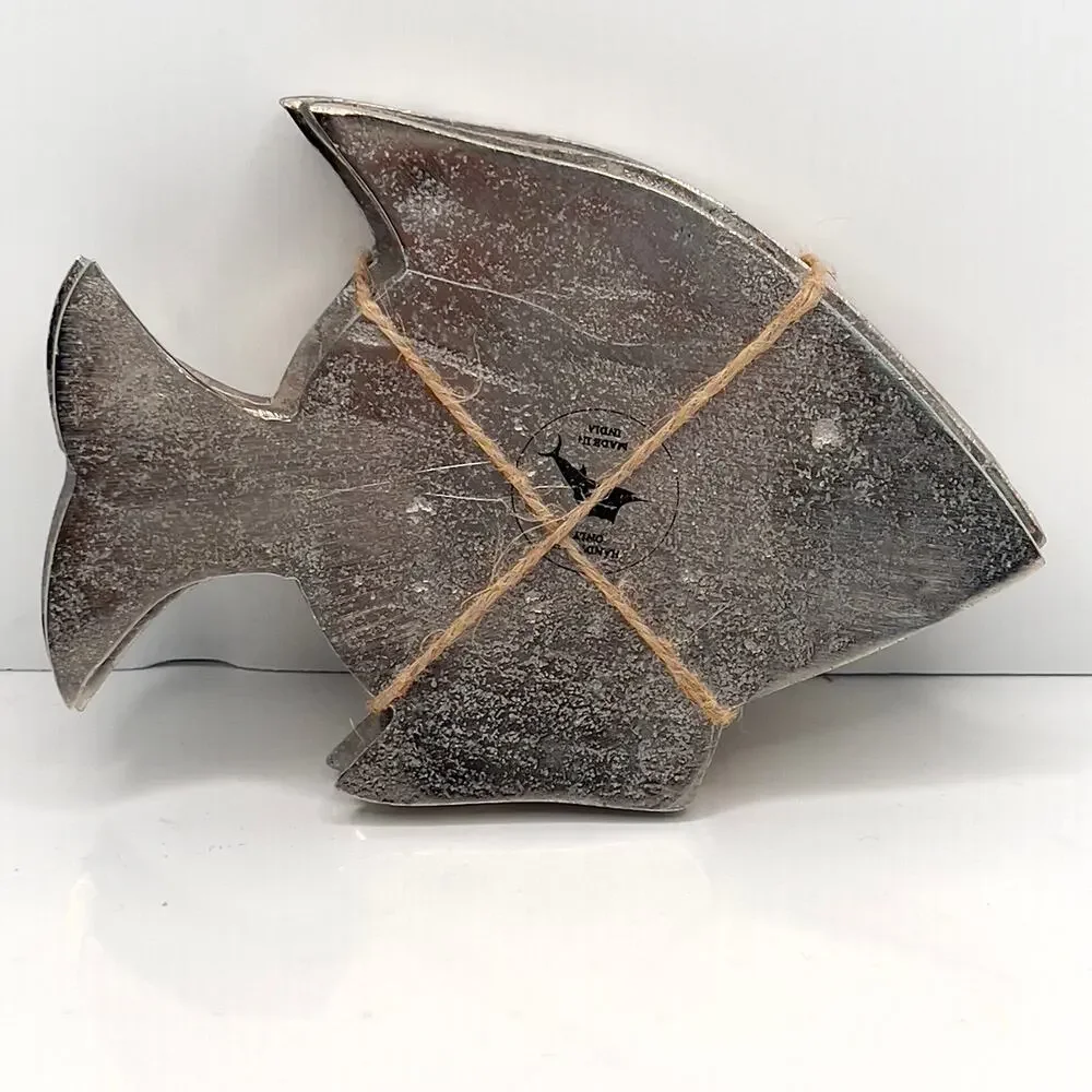 Tommy Bahama silver metal fish-shaped coaster or candle holder set.